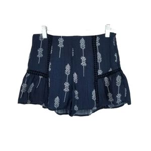 Moon River Eyelet Ruffled Arrow Print Shorts